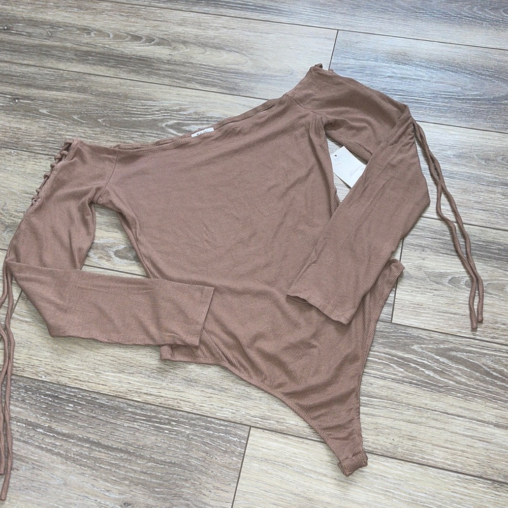 Tobi beige off the shoulder bodysuit with arm tie detail.